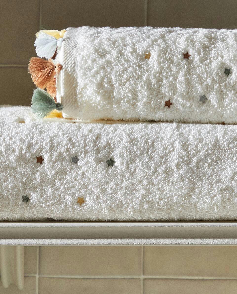 TOWEL WITH TASSELS AND STARS