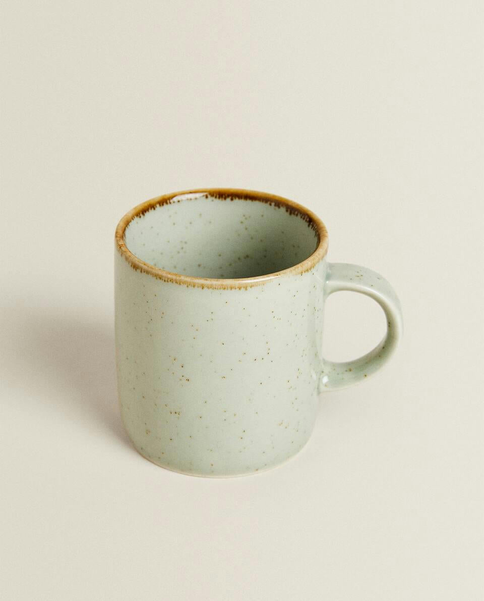 PORCELAIN MUG WITH ANTIQUE FINISH RIM
