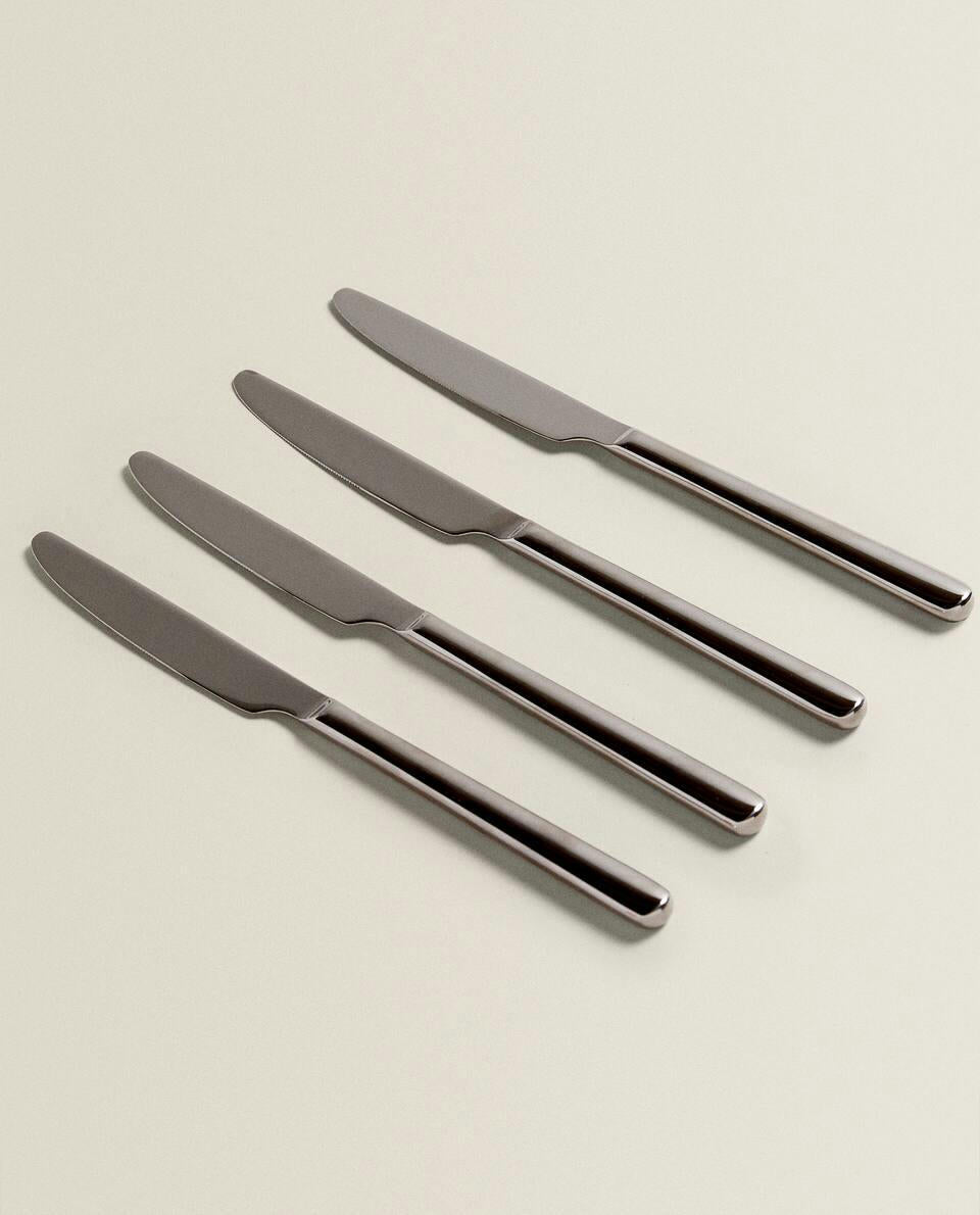 BOX OF 4 SHINY STEEL KNIVES