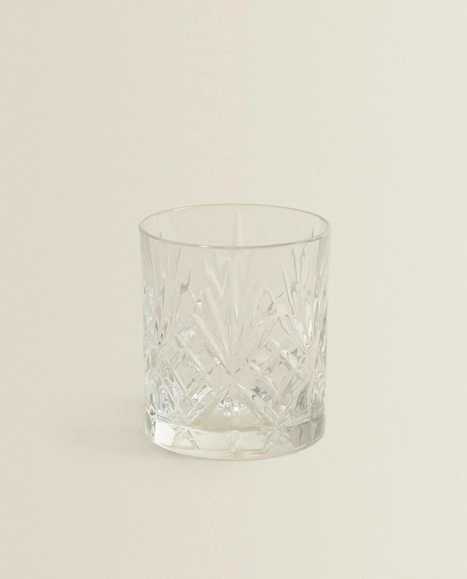 CRYSTALLINE TUMBLER WITH RAISED DESIGN